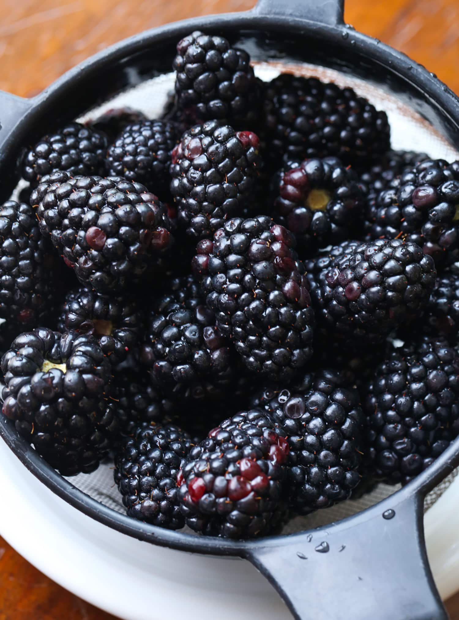 Blackberries in a strainer after washing