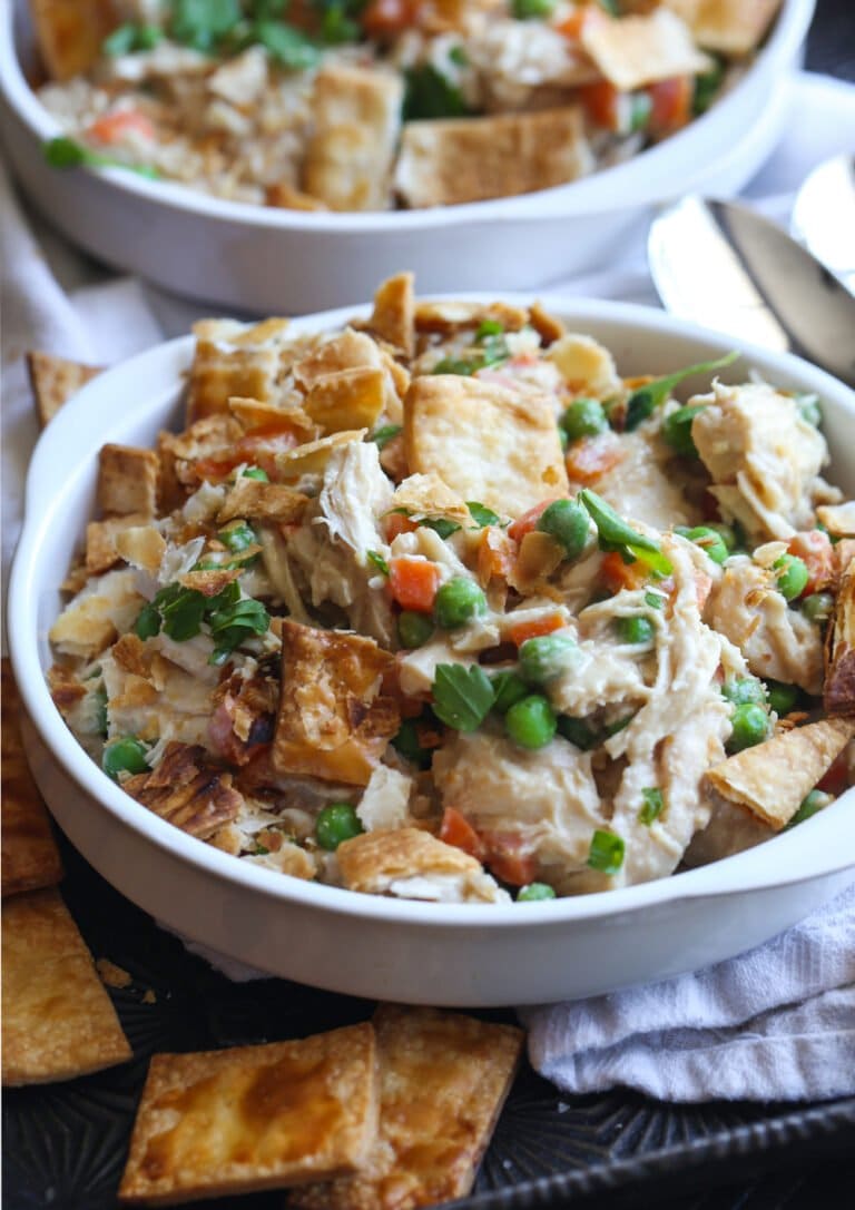 Chicken Pot Pie made in a Crock Pot served in a bowl with pie crust