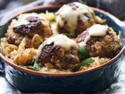 German Meatballs with Gravy in a Blue Ceramic Bowl