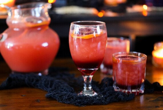 Party punch with a layered effect in a goblet