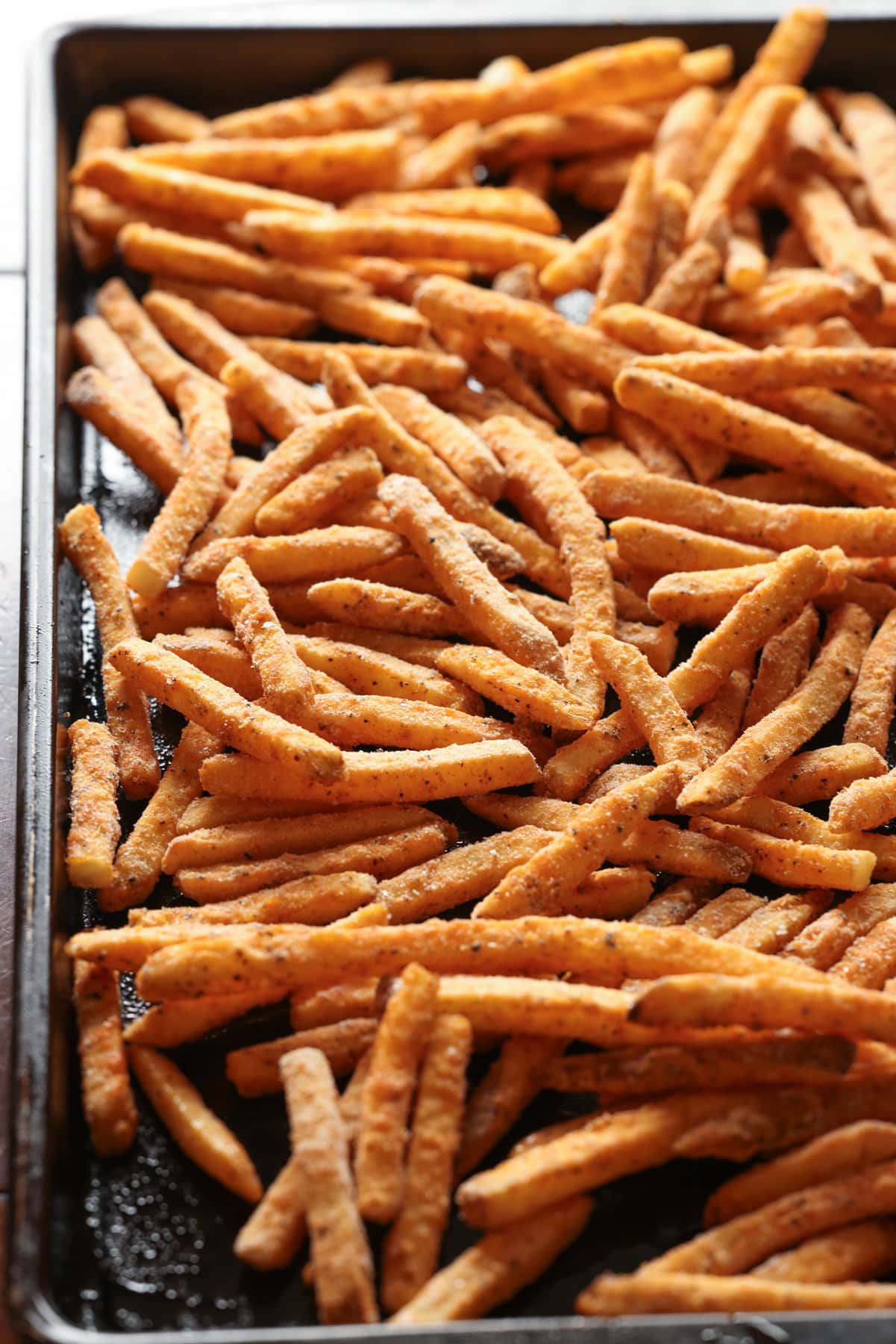 frozen french fries on a baking sheet