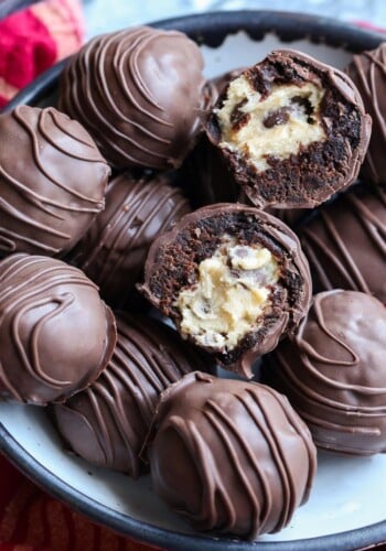 Brownie truffle filled with cookie dough broekn in half