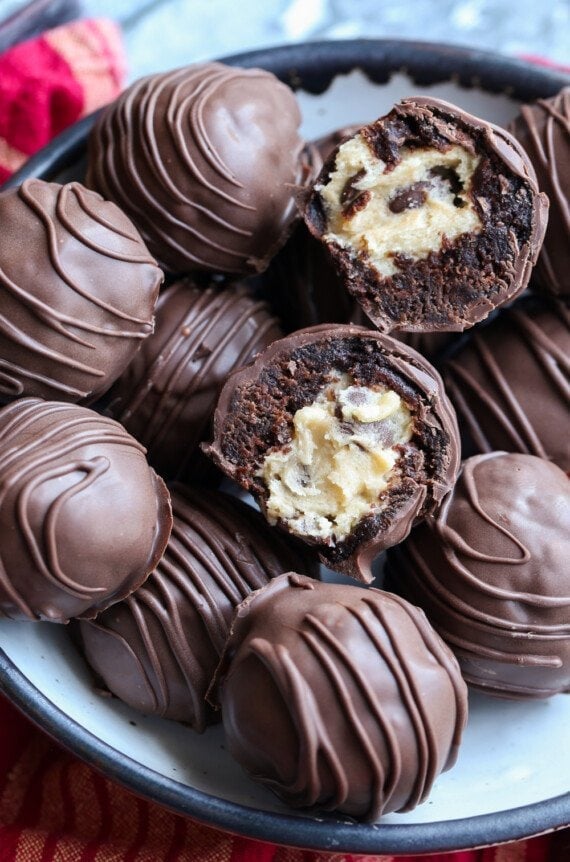 Brownie truffle filled with cookie dough broekn in half