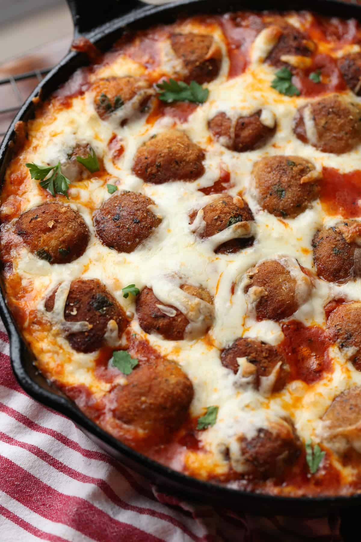Chicken Parm meatballs covered in melted cheese