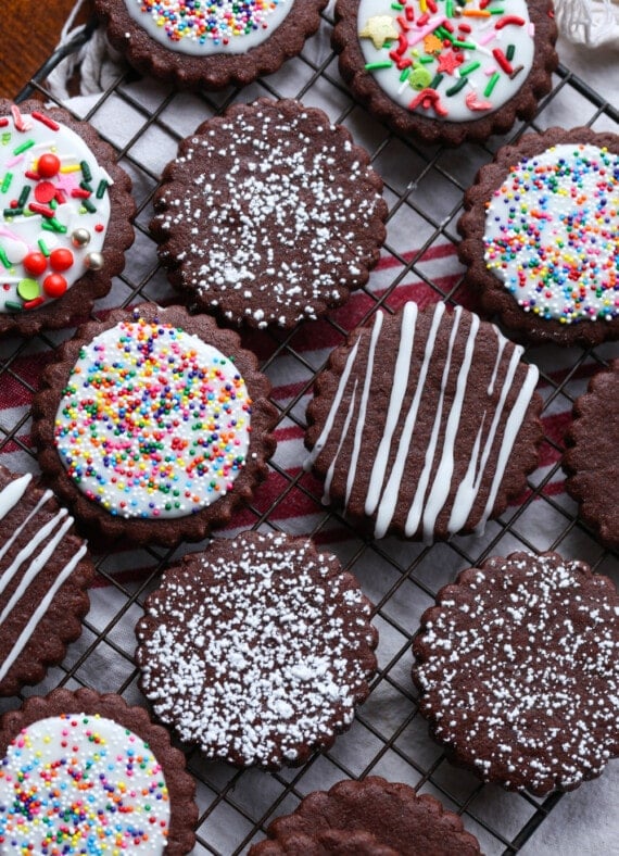 Chocolate Sugar Cookies Frosted with Sprinkles and Dusted with Powdered Sugar