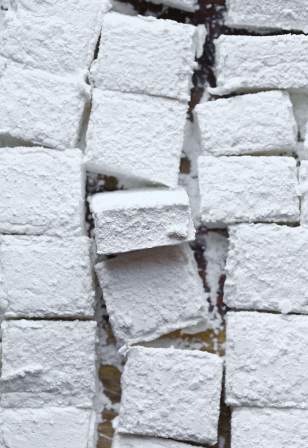 A Bunch of Square Homemade Marshmallows on a Wooden Surface
