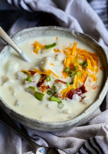 Creamy potato soup covered with bacon and cheese