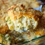 Cheesy broccoli rice casserole with crushed cracker topping.