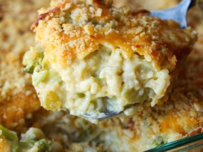 Cheesy broccoli rice casserole with crushed cracker topping.