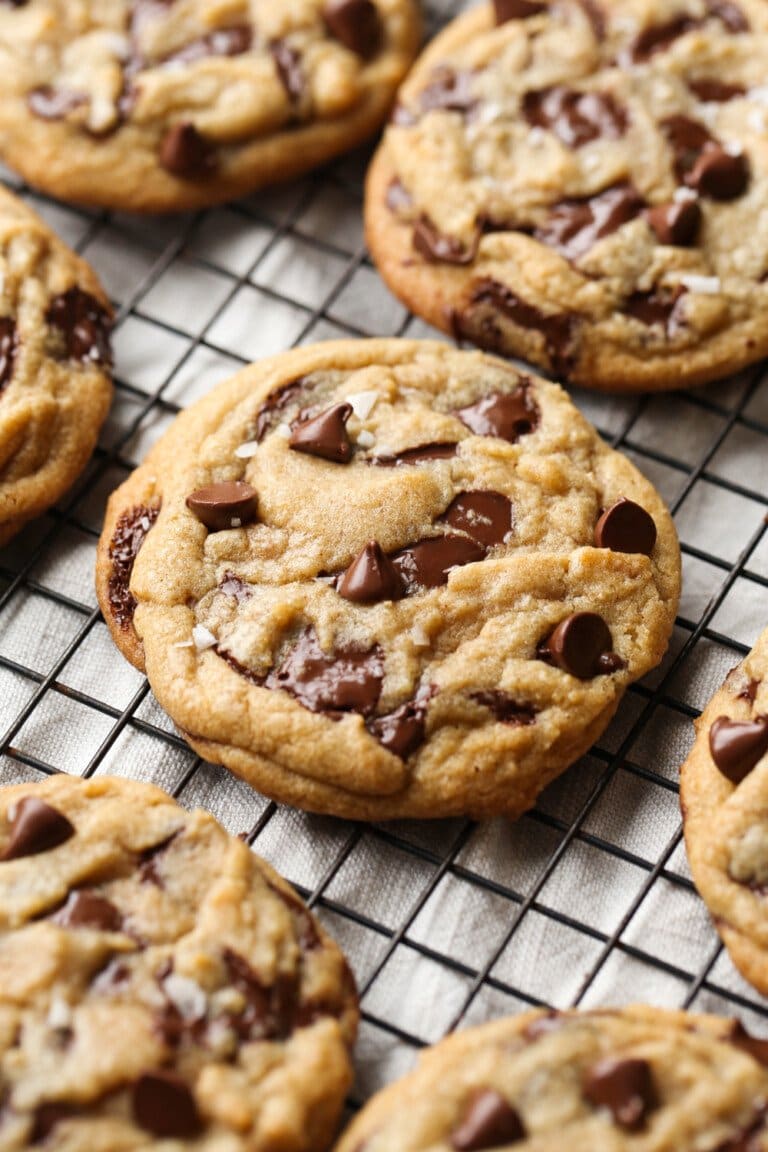 Brown butter chocolate chip cookies on a wire cooling rack