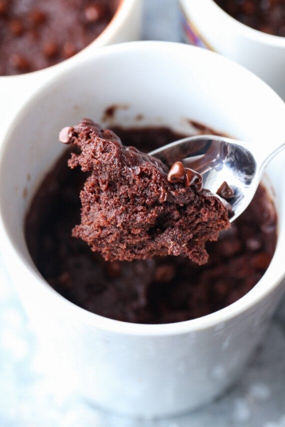 spoon with brownie out of a mug