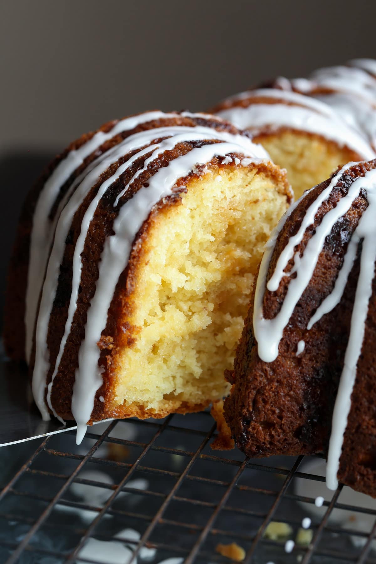 Vanilla bundt cake with icing on top.