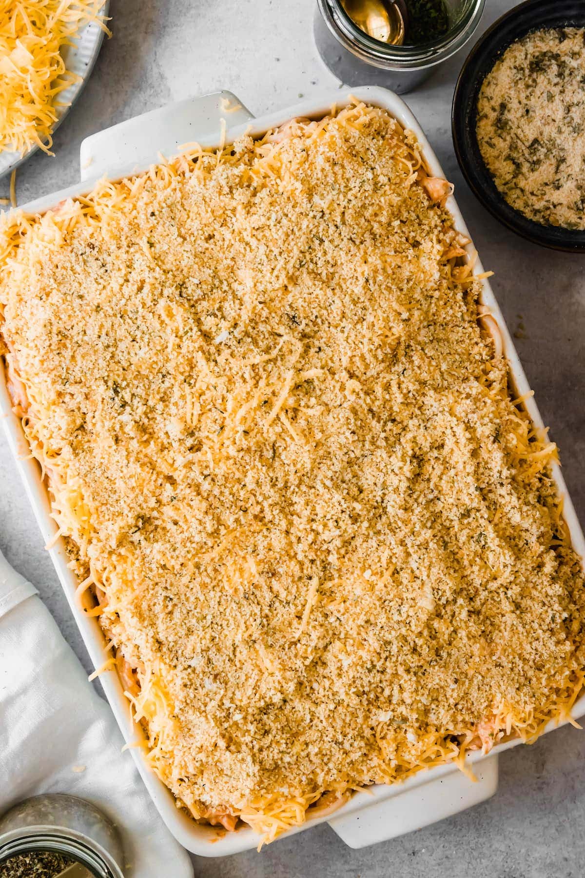 Unbaked Spaghetti Casserole with chicken in a 9x13 baking pan