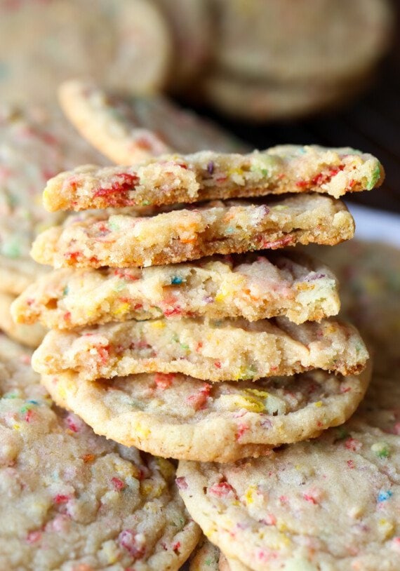 Sugar cookies with fruity pebbles cereal broken and stacked
