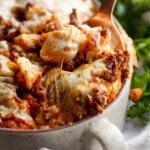 Unstuffed Shells pasta casserole with a spoon and melty cheese