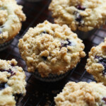 Blueberry cream cheese muffins on a cooling rack.