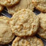 Coconut Cookies piled on a wire cooling rack