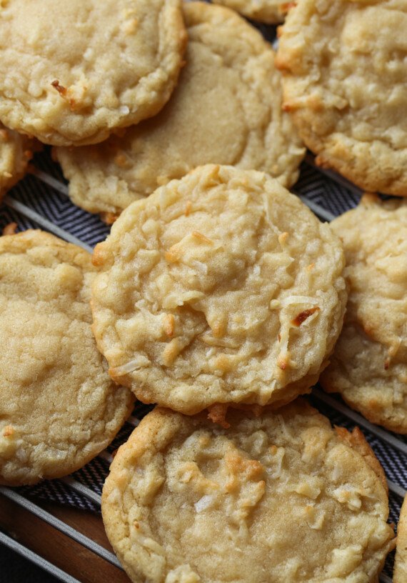 Coconut Cookies piled on a wire cooling rack