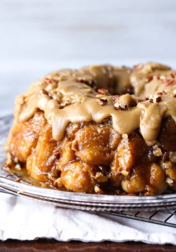 Pull Apart Monkey Bread with praline icing on a platter