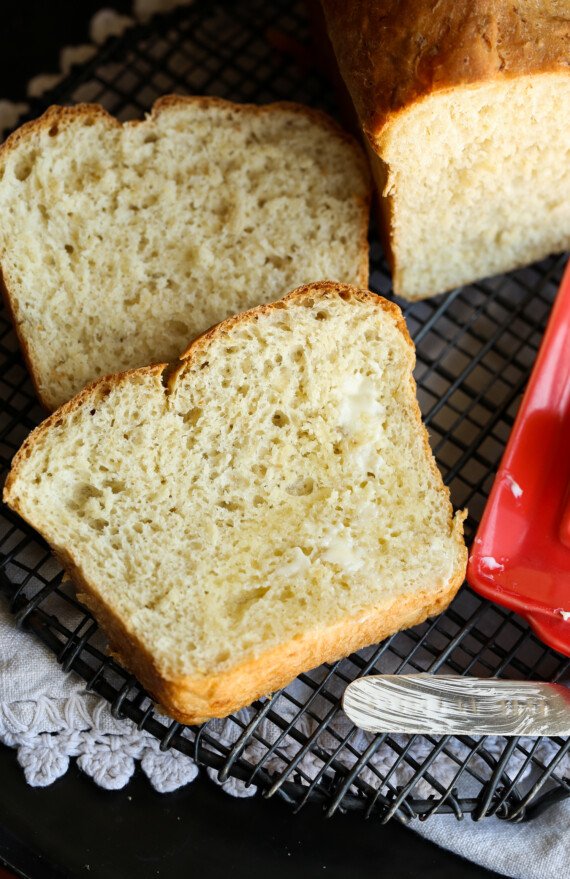 Sliced and buttered honey oatmeal bread.