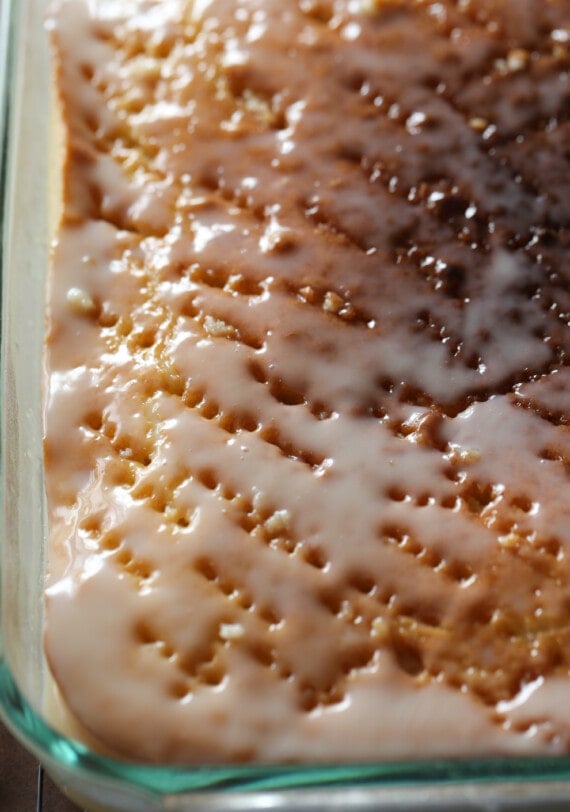 Cake with holes poked in and glaze on top