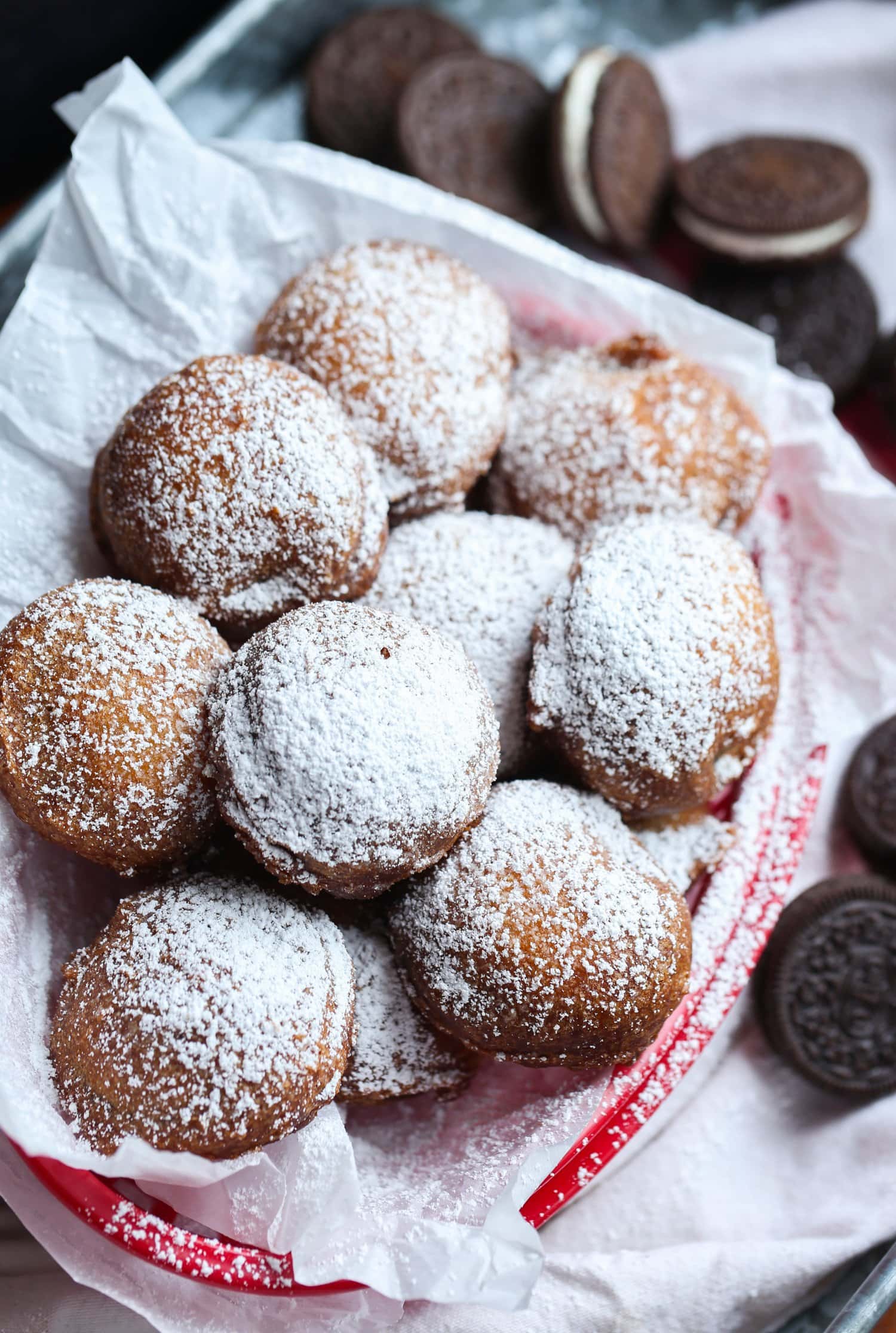 powdered sugar sprinkled on top of batter fried Oreos
