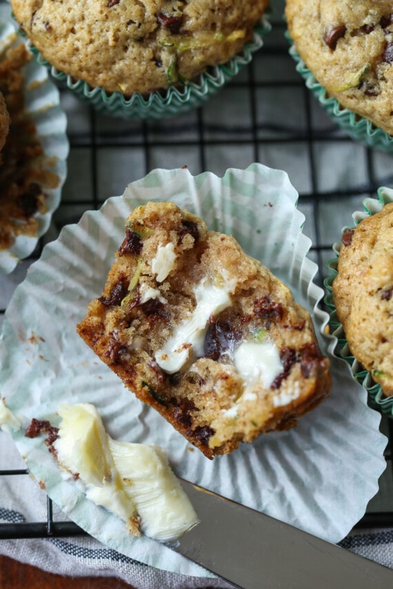 Muffin cut in half with butter spread