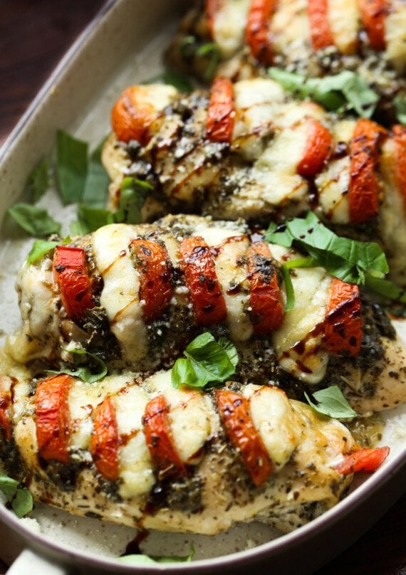 Hasselback Caprese Chicken in a baking dish
