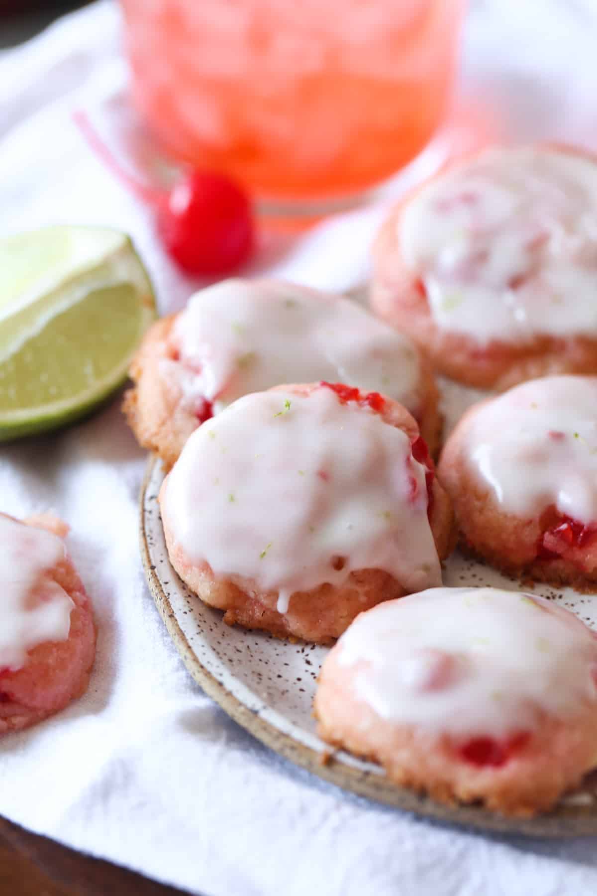 cherry cookies topped with lime glaze