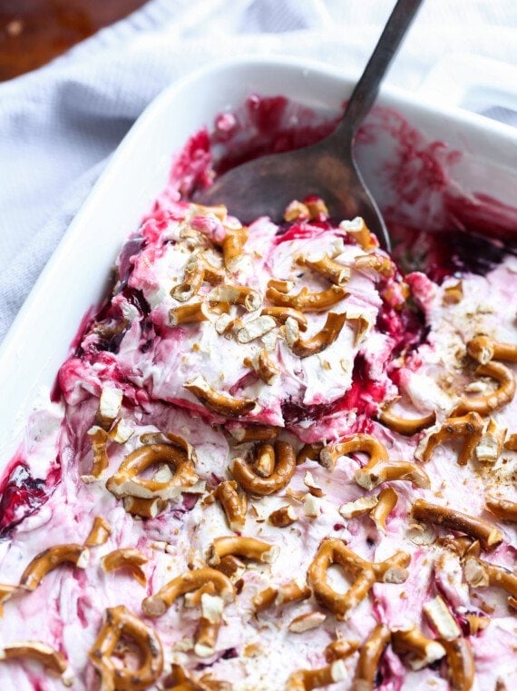 Scooping the Cherry Pretzel Dessert with a spoon