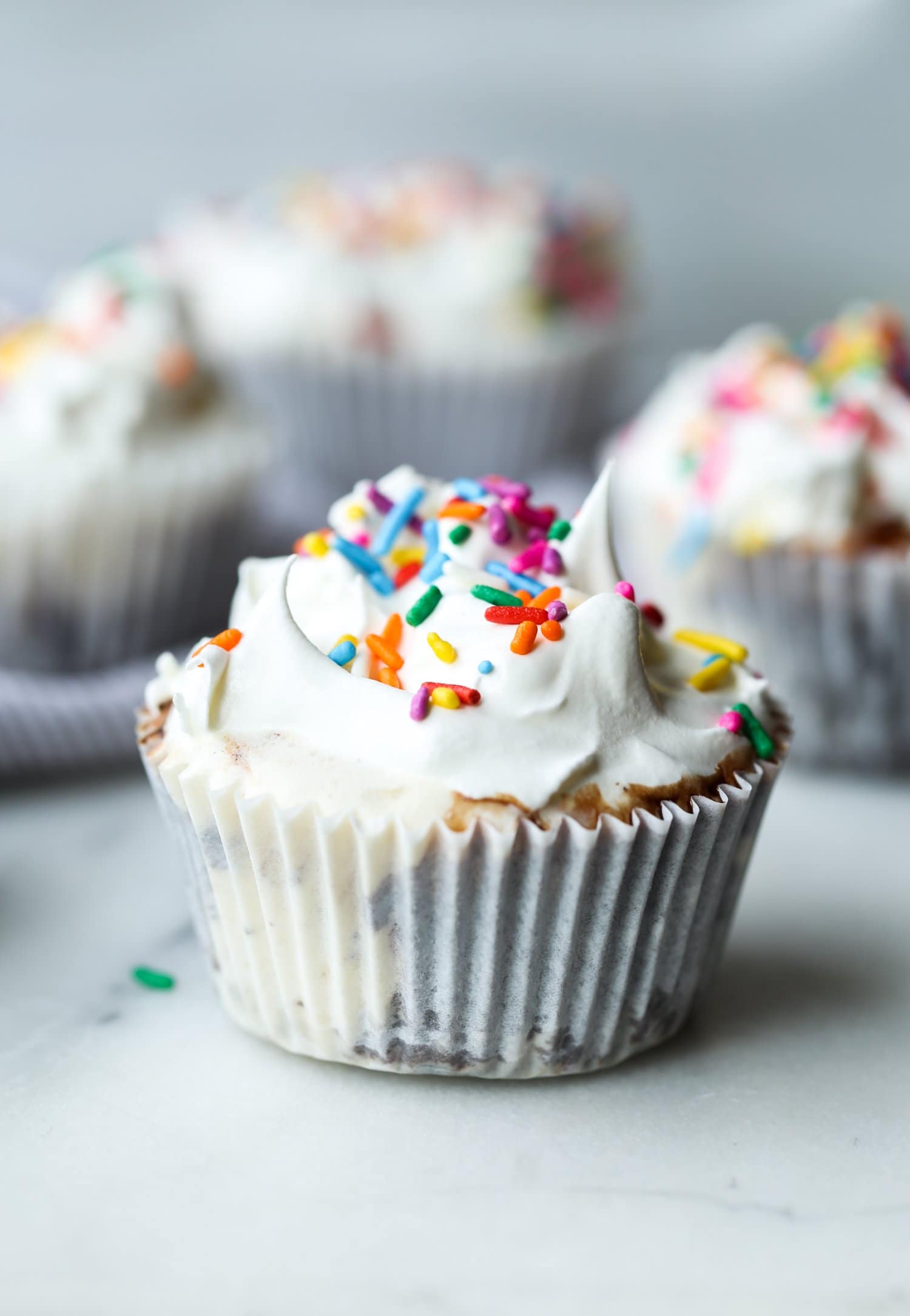no bake cupcake made with vanilla ice cream in a liner
