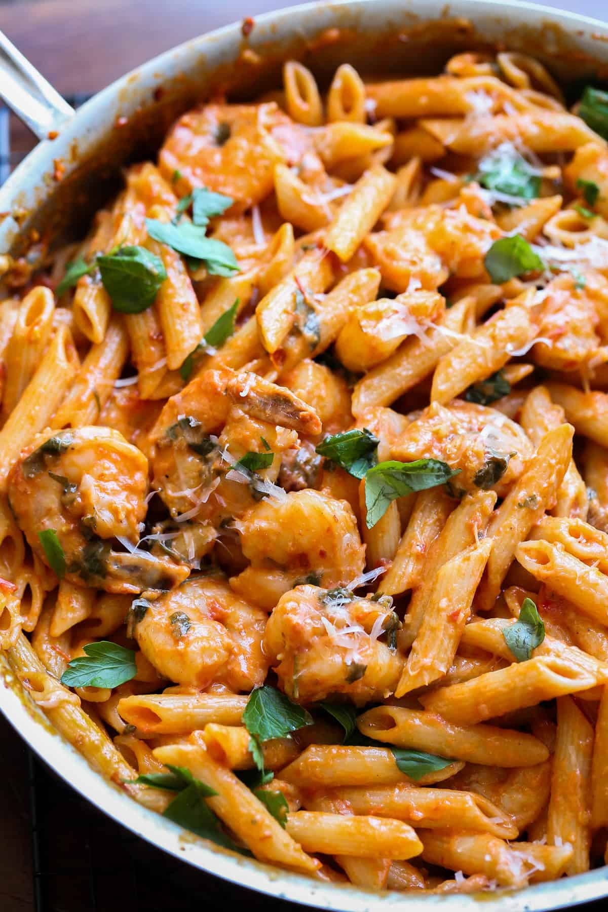 Penne pasta tossed in a creamy tomato sauce with shrimp