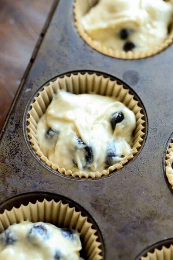 Banana blueberry muffin batter in a cupcake liner.