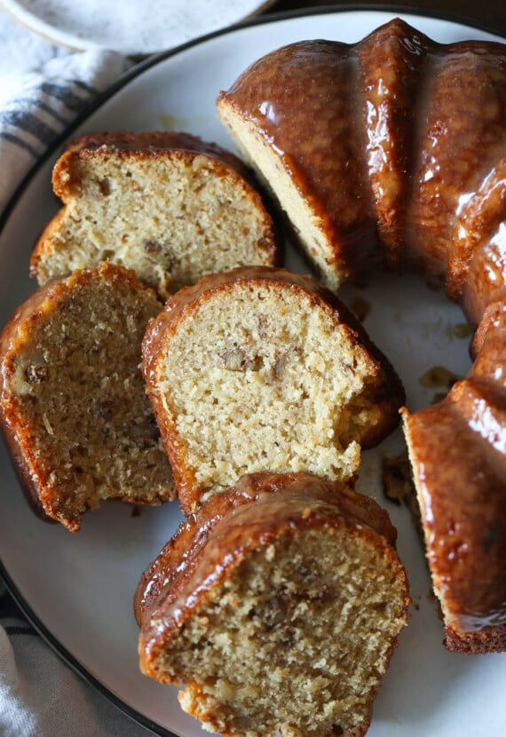 Sliced banana pound cake on a plate.