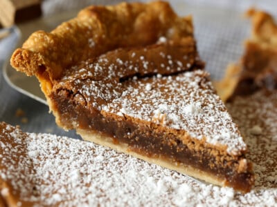 Chess Pie being served dusted in powdered sugar