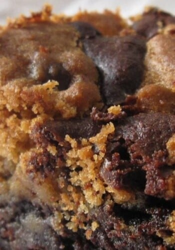 A super close-up shot of a baked brookie with cookie dough in the center