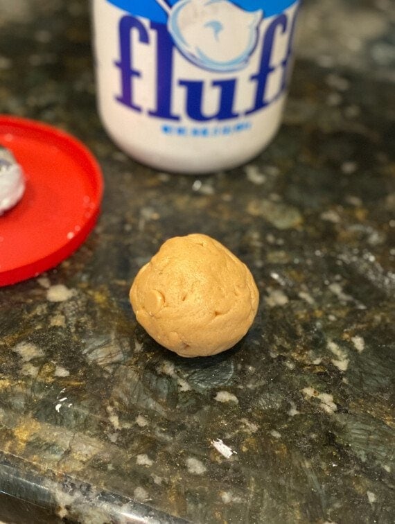 peanut butter cookie dough rolled into a ball