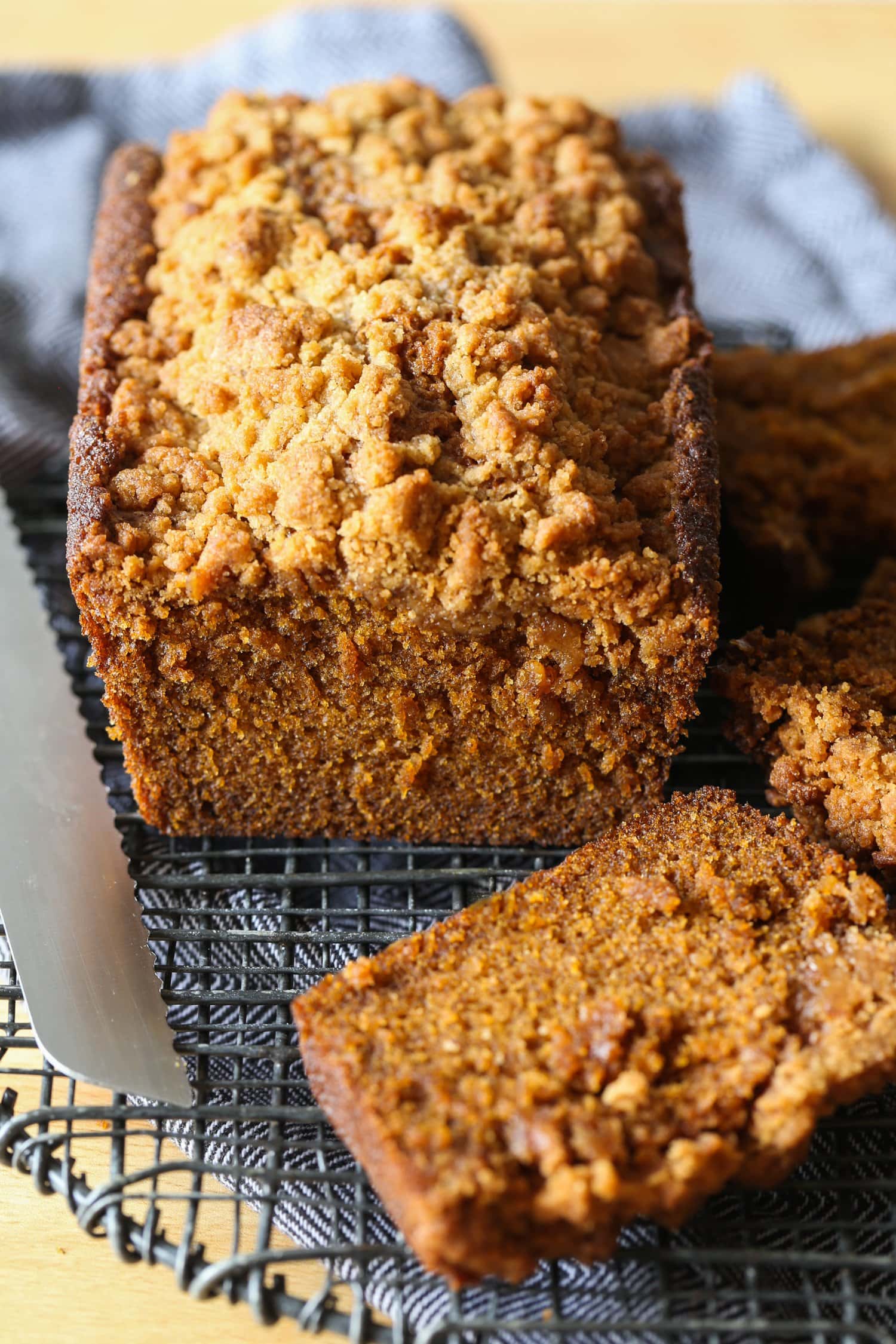 a loaf and slices of pumpkin bread