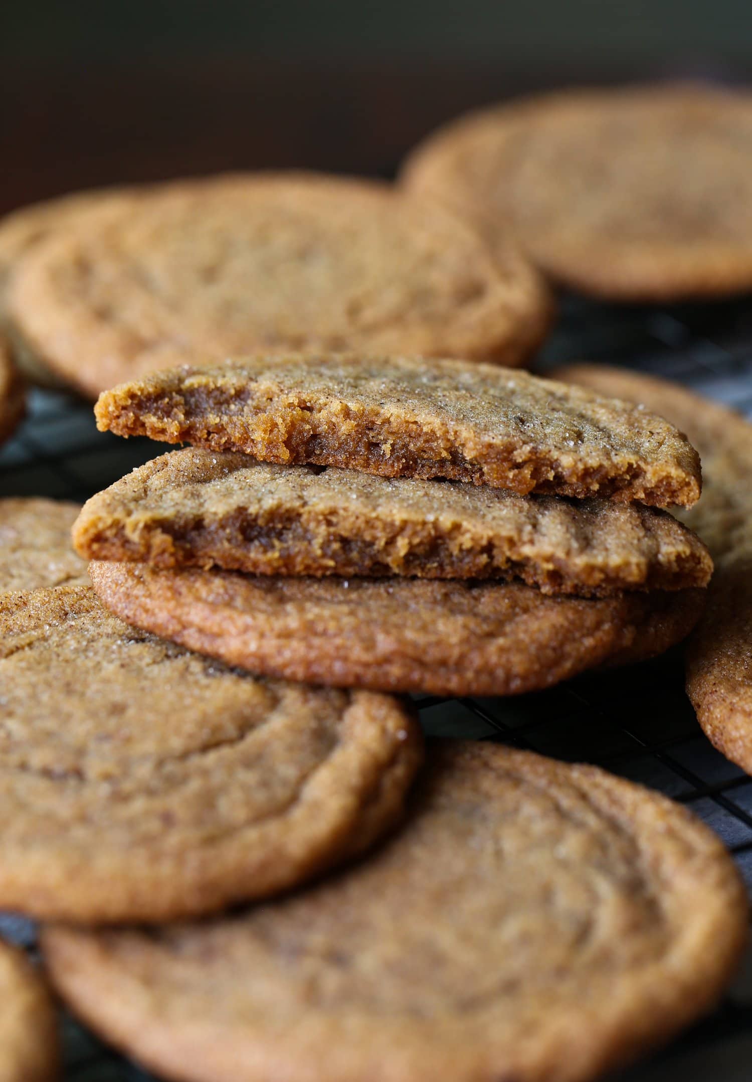 thin, chewy pumpkin cookies broken in half