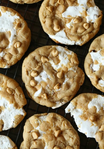 Fluffernutter Cookies with gooey marshmallow fluff and peanut butter chips on a wire rack
