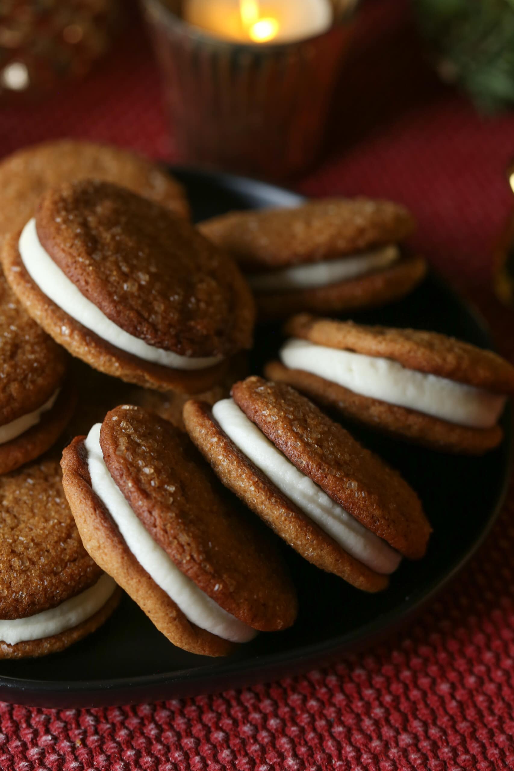 gingerbread sandwich cookies lined on a cookie platter