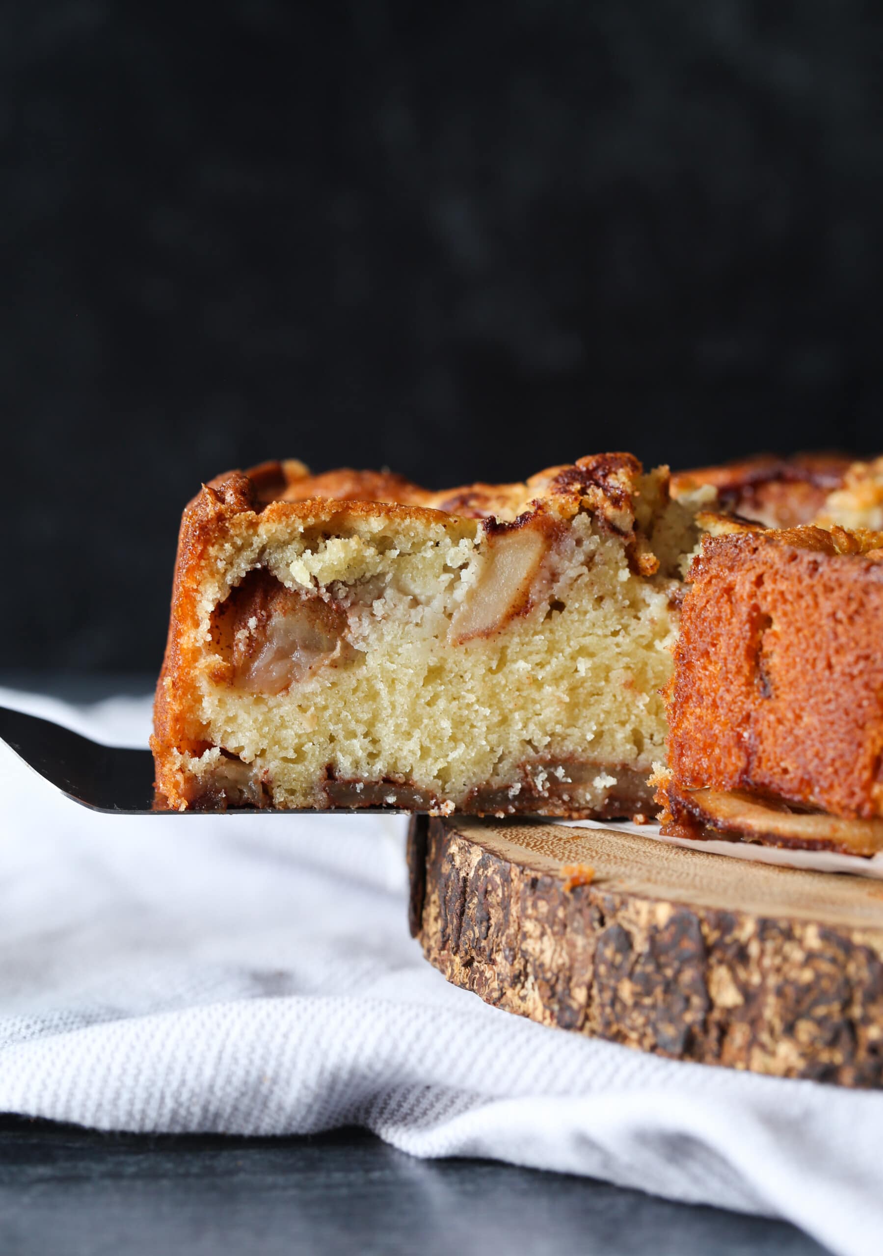 As slice of apple cake on a spatula