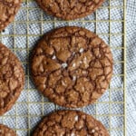 Salted crinkle cookies on a wire rack.