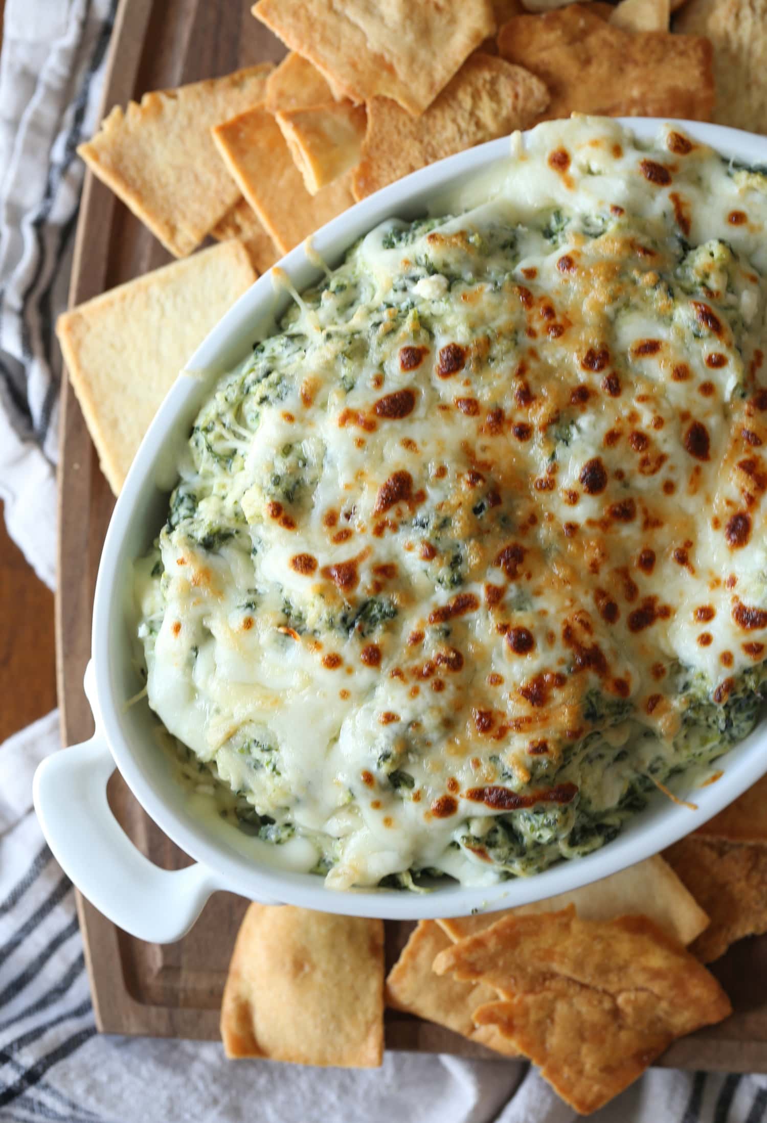 Broiled spinach and artichoke dip served with pita chips.