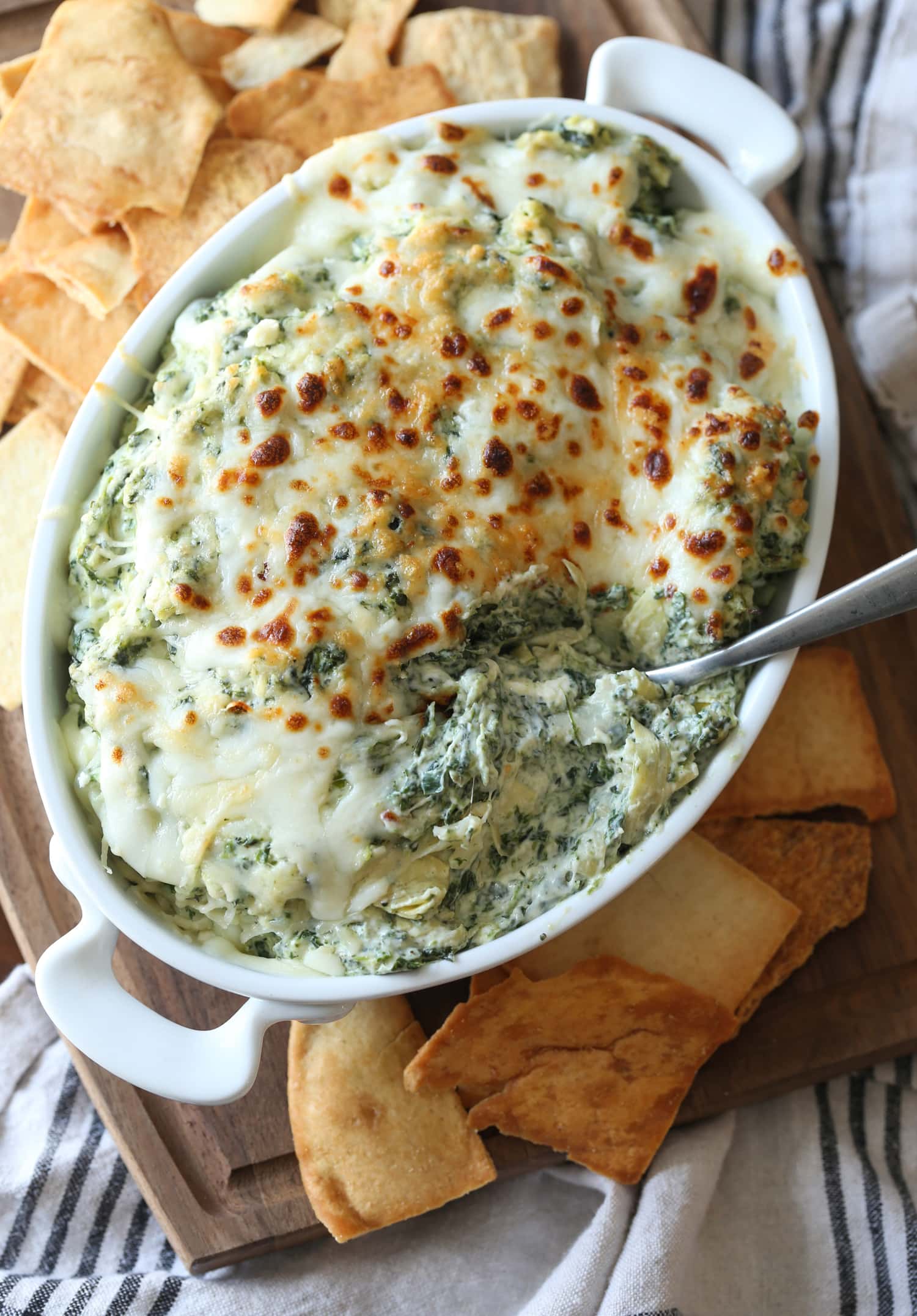 Broiled spinach and artichoke dip served with pita chips.