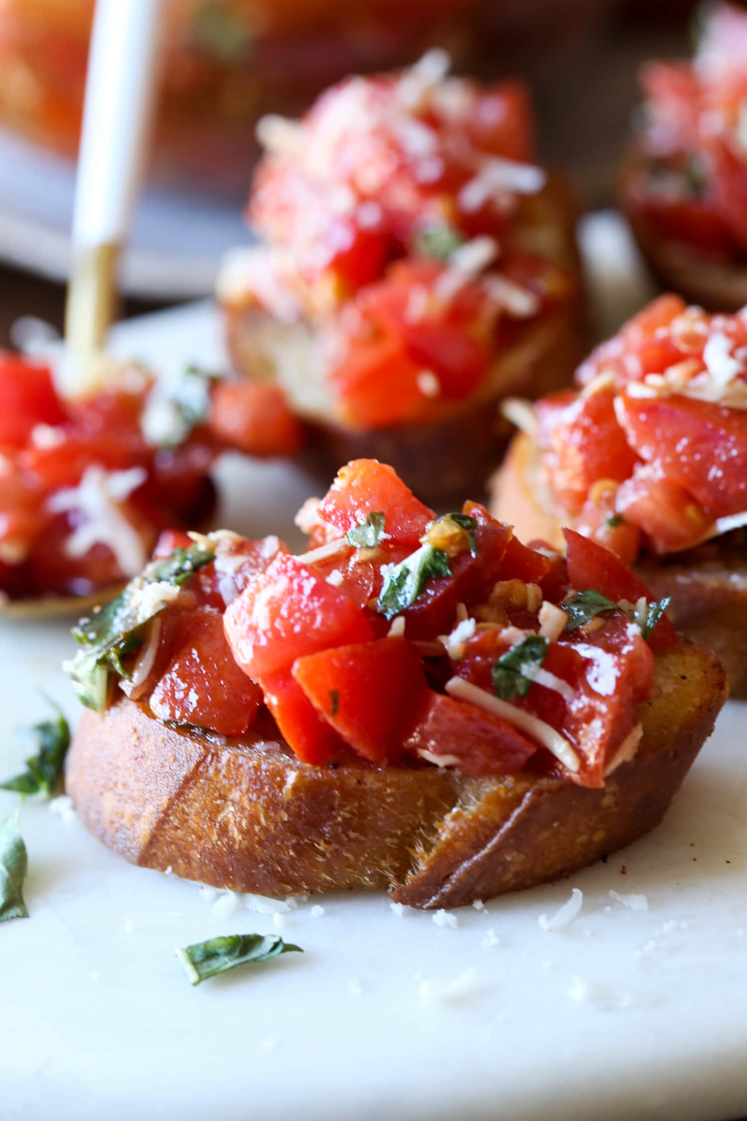 A slice of toasted bread topped with bruschetta.