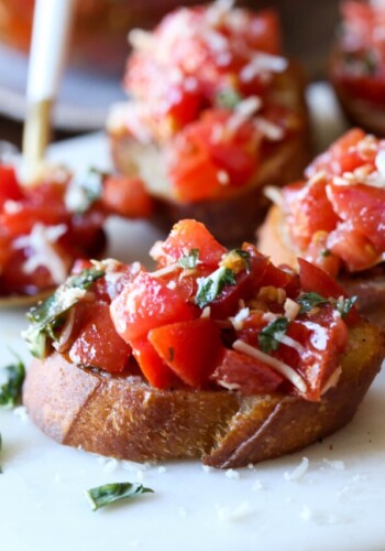 A slice of toasted bread topped with bruschetta.