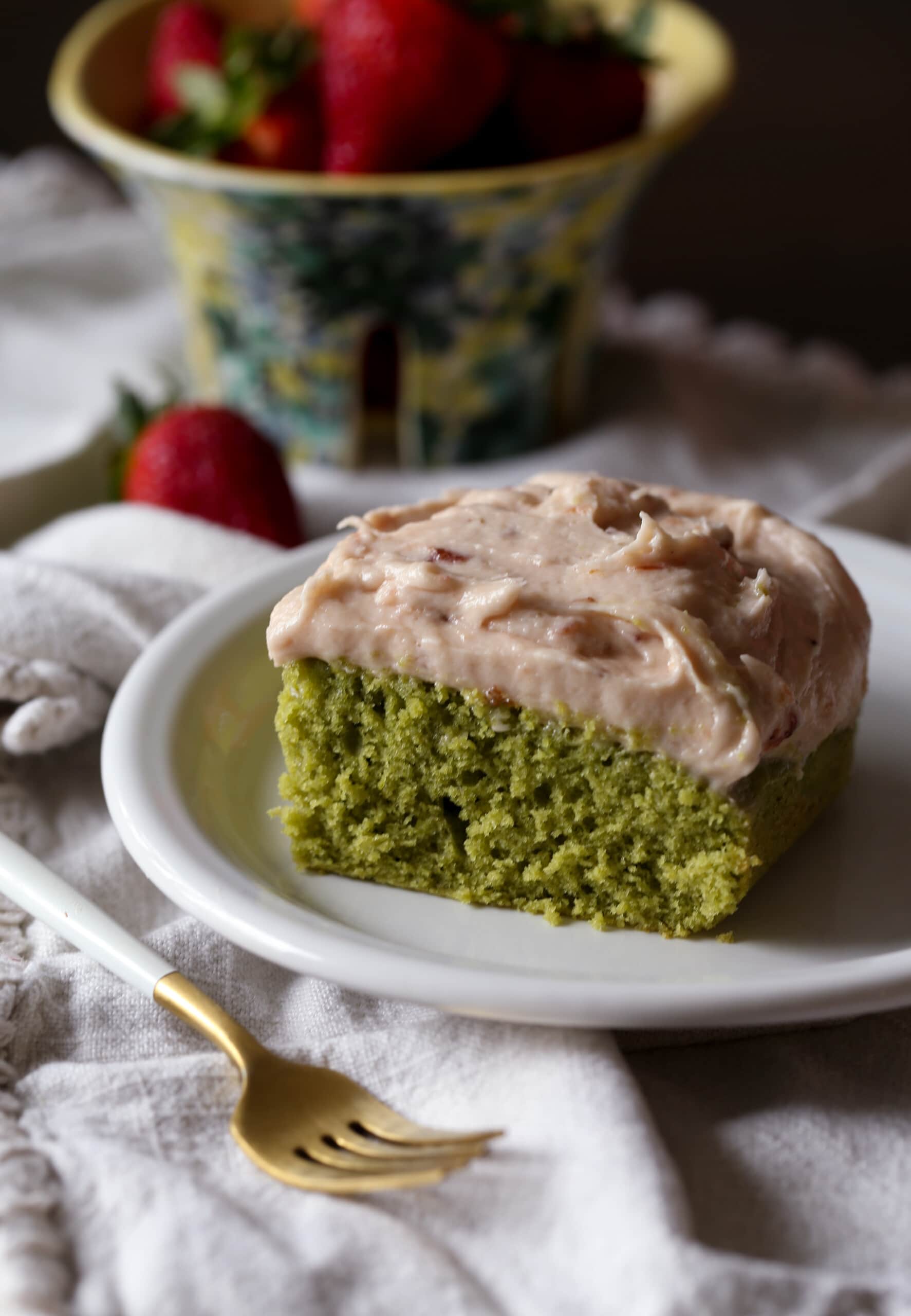 matcha green tea cake with strawberry frosting