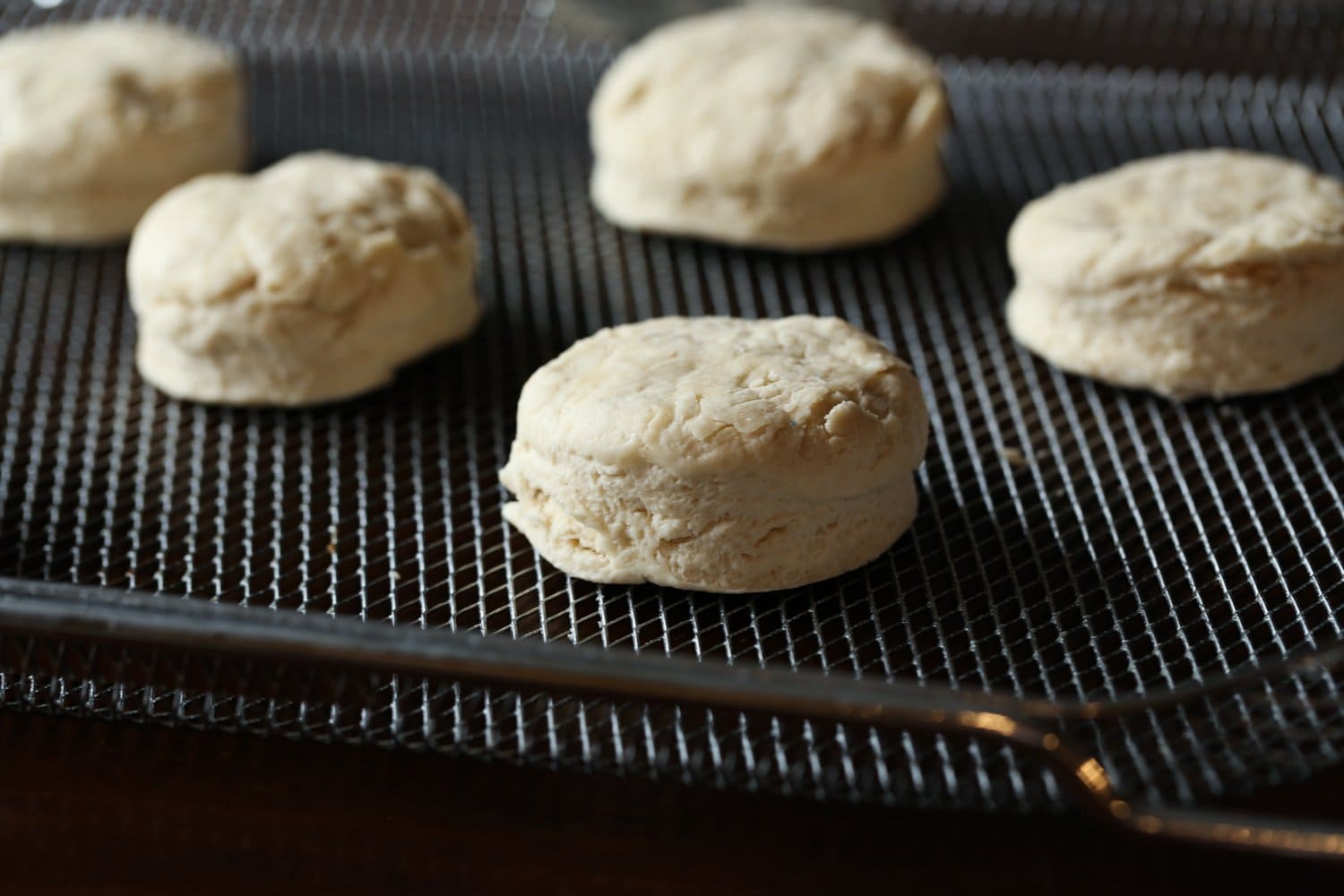 biscuit dough on an air fryer rack