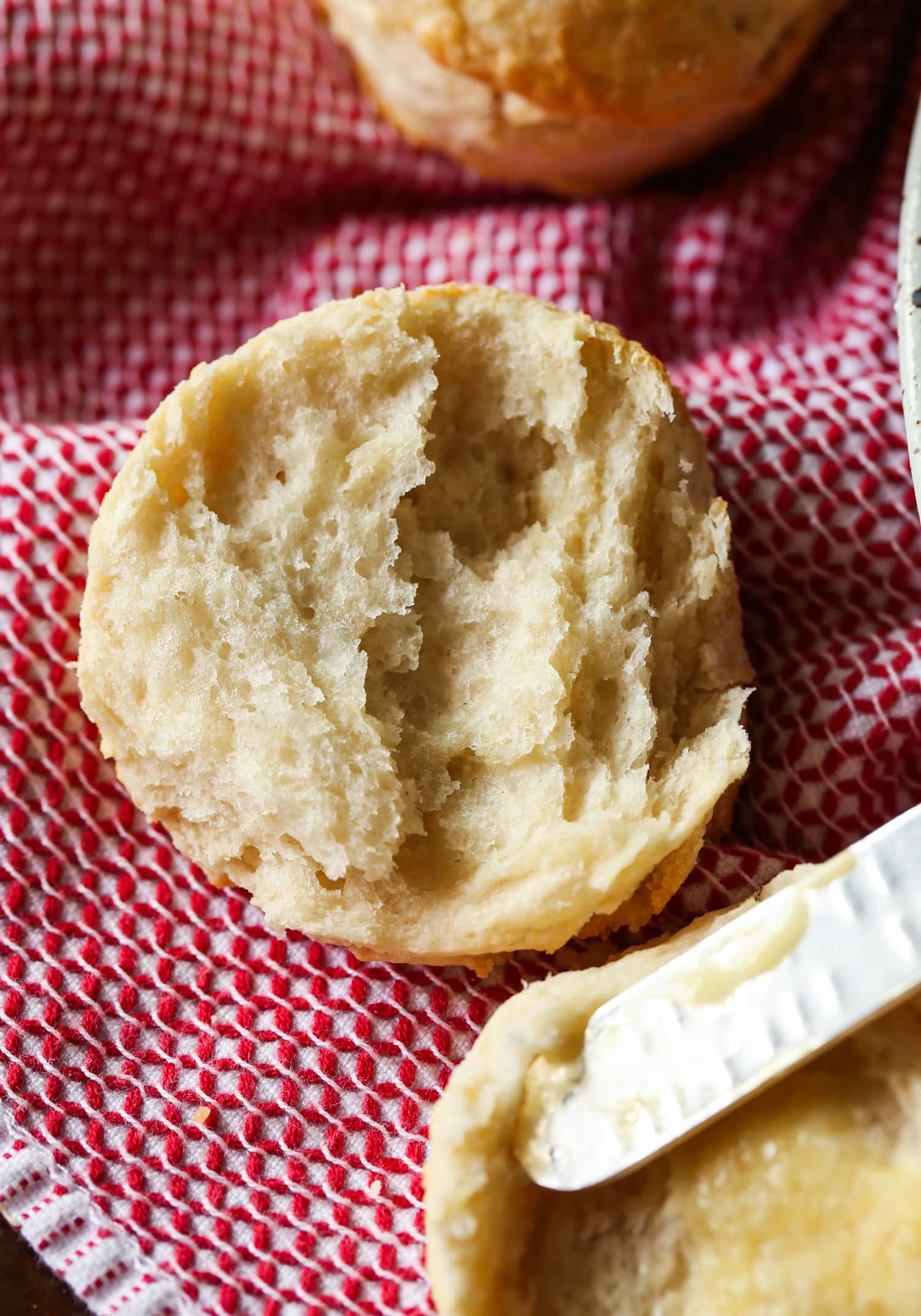 biscuit cut in half on a towel